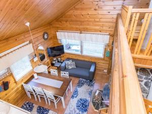 an overhead view of a living room and dining room at Holiday Home Pyhä-vuonelo by Interhome in Pyhätunturi +8 photos