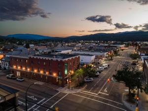 an aerial view of a city at night at The Baker Hotel in Cranbrook