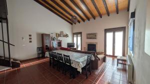 a living room with a table and a couch at Rioja en calma in Villalobar de Rioja