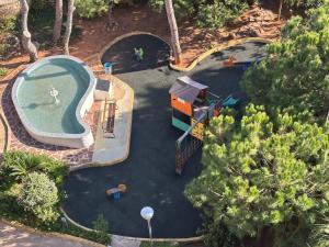 an overhead view of a water park with a swimming pool at Ap. con piscina, Moraira centro. in Moraira
