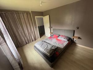 a bedroom with a bed in a room at Ti caze Montplaisir 2 in Saint-Louis