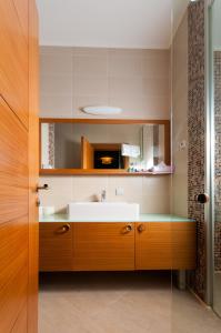 A bed or beds in a room at City Hotel Plovdiv