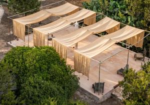 an overhead view of a tent in a garden at Can Joseph I Can Toni Platera in Sant Francesc Xavier