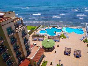 an aerial view of a hotel and the ocean at Astur Hotel & Residence in Veracruz