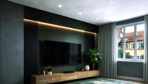 a living room with a flat screen tv on a wall at 4SEASONS -- Emerald Summer Lounge in Aalborg