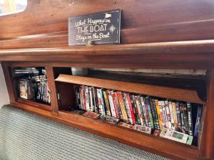 a book shelf filled with lots of books at Asila's Ark in Keyworth