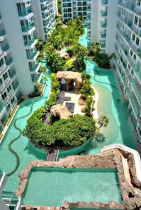 a model of a water slide in a resort at Amazon Condo, Building B, ground floor with direct pool access in Jomtien Beach