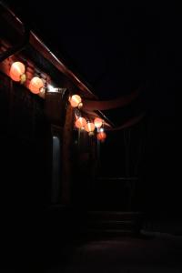 a row of lights are lit up in the dark at Netri SPA in Zofʼyuvka