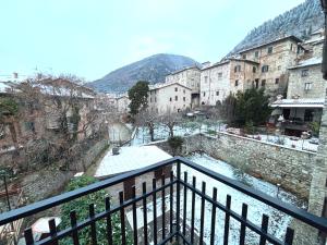 a view of a city from a balcony at Residenza Le Logge in Gubbio