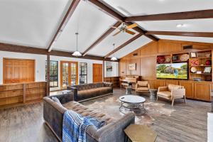 a large living room with couches and a tv at 7A Ranch in Wimberley