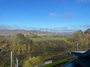 a view of a field from the roof of a house at Studio AG in Mellet