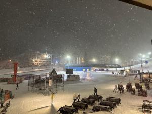 an ice skating rink in the snow at night at Krčma Jahorina in Jahorina