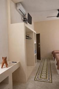 a living room with a rug on the floor at Chulel Hotel Origen in Cedro