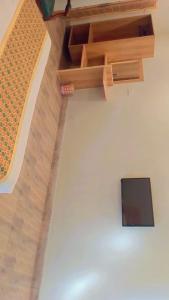 a tv sitting on the floor in a room at Sky view Resort Shogran in Shongran +30 photos