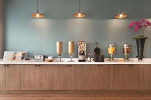 a counter with several candles on top of it at Park Inn by Radisson Brampton, ON in Brampton +21 photos