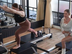two women in a gym with a woman standing on a treadmill at Secana Beachtown Resort & Villas in Canggu +45 photos