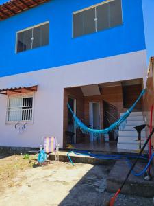 a house being constructed with a blue hue at Cantinho das Joaninhas in Prado +23 photos