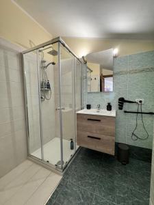a bathroom with a shower and a sink at Bella Todi Apartment in Todi +18 photos