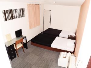 Et værelse på Sakura Hotel Oami