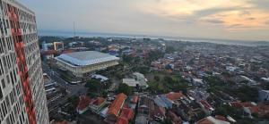an aerial view of a city with a building at Alton by Be rent in Jatingaleh