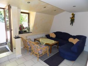 Ein Sitzbereich in der Unterkunft Gästehaus Eschbach