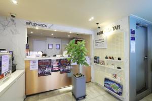a store with a potted plant in a room at Hotel Yam Bucheon Station in Bucheon