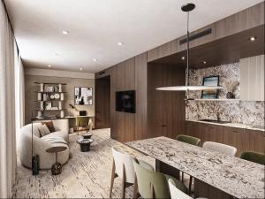 a living room with a table and chairs at Novotel Lviv Center in Lviv