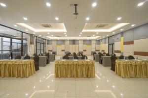 a large banquet hall with tables and chairs at The Tree Riverside Resort Kaeng Krachan in Kaeng Krachan +203 photos
