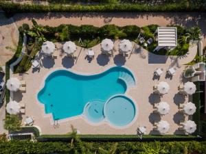 an overhead view of a resort with a swimming pool at Blu Tropical Resort in Zambrone