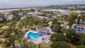 an aerial view of a resort with a swimming pool at The Palm Nest in Quinta do Lago