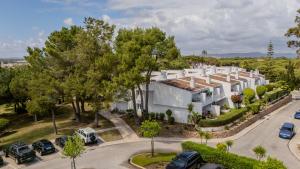 an aerial view of a large white building at The Palm Nest in Quinta do Lago