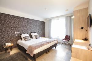 Postel nebo postele na pokoji v ubytování Hotel Lepelbed
