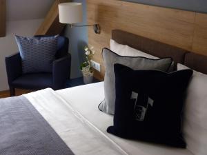Postel nebo postele na pokoji v ubytování Hotel Alte Vogtei