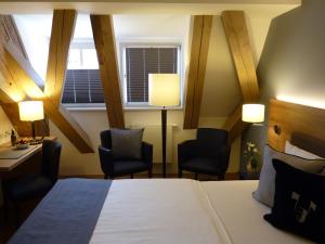Postel nebo postele na pokoji v ubytování Hotel Alte Vogtei
