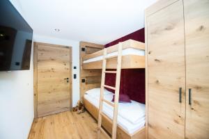 Postel nebo postele na pokoji v ubytování Pepi's Suites - Lechtal Apartments