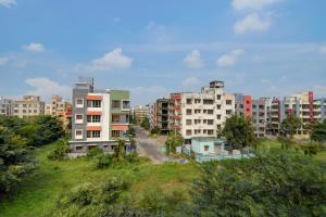 a view of a city with tall buildings at Avinaav Inn in New Town