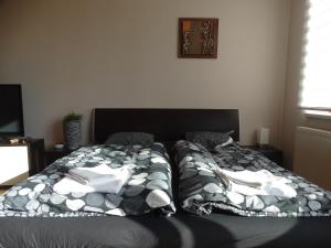 Postel nebo postele na pokoji v ubytování Apartment Čeladná