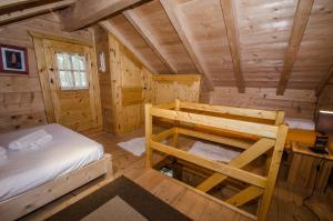 Poschodová posteľ alebo postele v izbe v ubytovaní Chalet Sépia