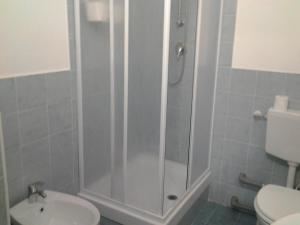 Kúpeľňa v ubytovaní Olimpica Relais guest house