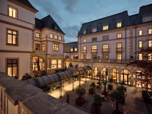 a view of the courtyard of a building at The Florentin by Althoff Collection in Frankfurt