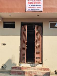 an open window on the side of a building at Hotel Raghav in Orchha