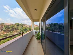 a balcony with a view of the city at Chic studio with amazing view in Yaoundé