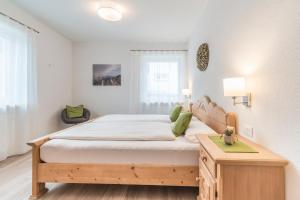 A bed or beds in a room at Ferienwohnung Eder