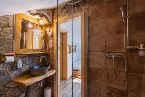 a bathroom with a shower and a sink at Rooms Murka in Bled +22 photos