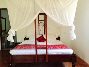 Voodi või voodid majutusasutuse Lazy Beach House toas
