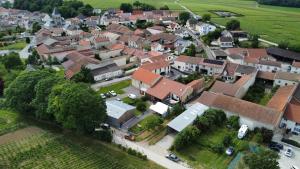 an aerial view of a small town with houses at La Bulle Enchantée in Berru