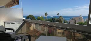 a balcony with a view of the ocean at Sea Side Oceanides in Juan-les-Pins