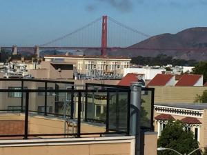 a view of the golden gate bridge from a building at Coventry Motor Inn in San Francisco