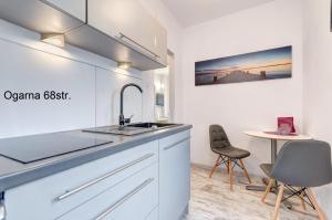 Kuchyňa alebo kuchynka v ubytovaní Twój Salon-Apartamenty Stare Miasto