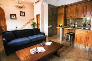 A cozinha ou cozinha compacta de La Isabela Suites